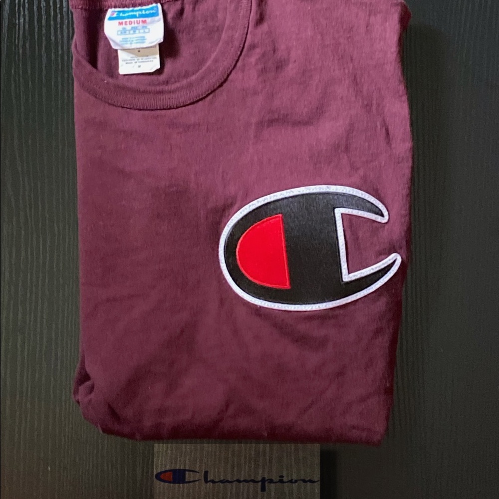 Champion Tee
